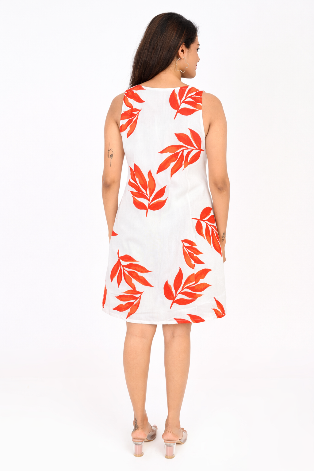 Back view of white printed rayon dress for women