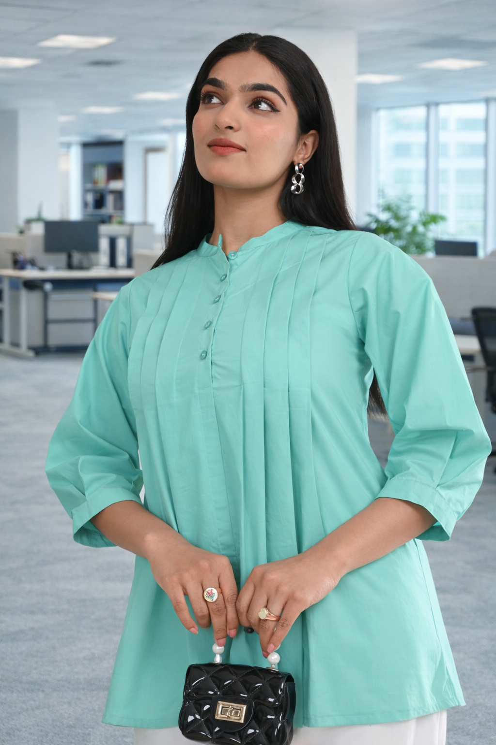 Mint green pleated cotton office wear top for women styled for office workwear