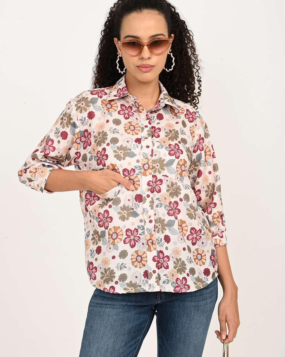 Cream maroon floral printed cotton top paired with denims – chic summer look by The Classy Clothing.