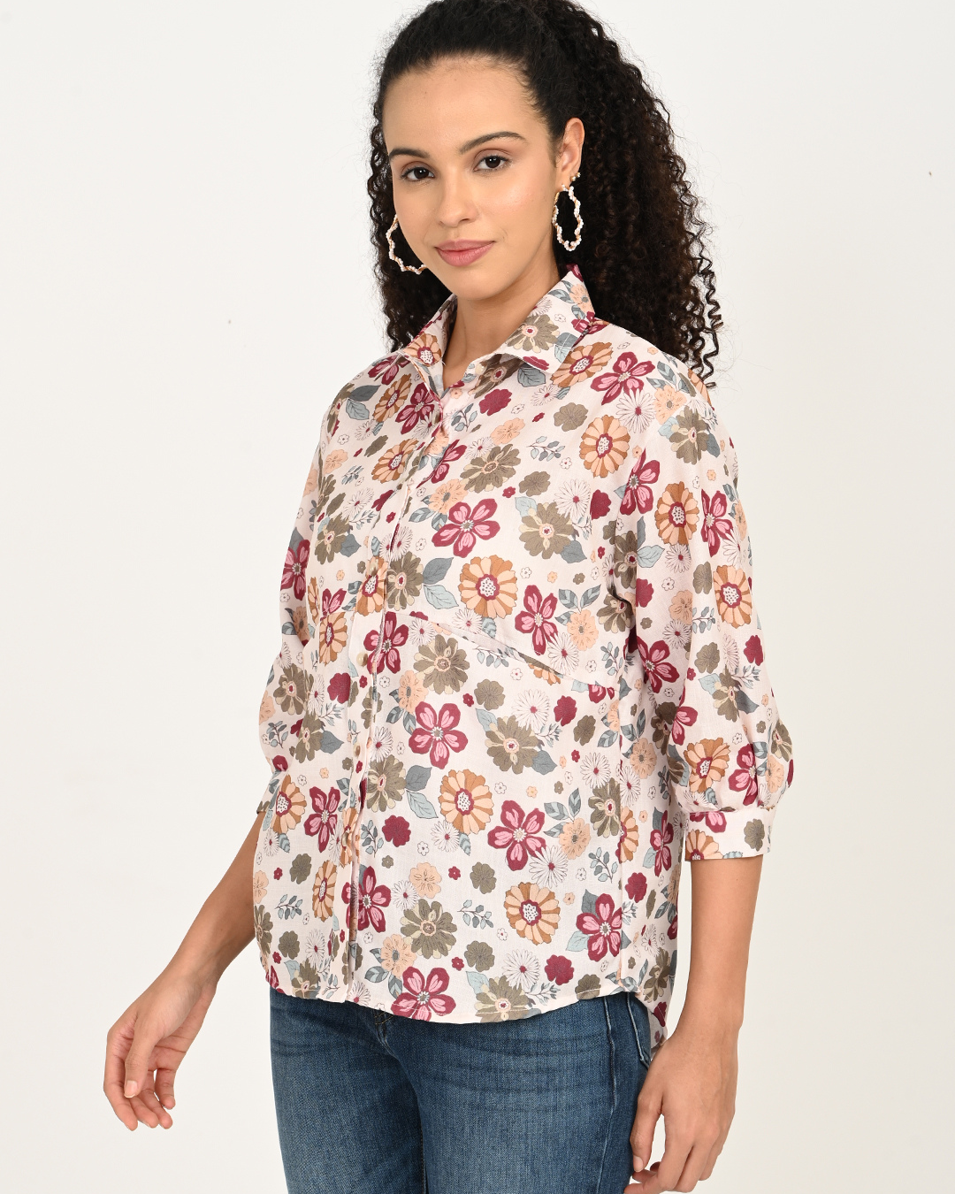 Front angle view of cream and maroon floral cotton top for women – The Classy Clothing.