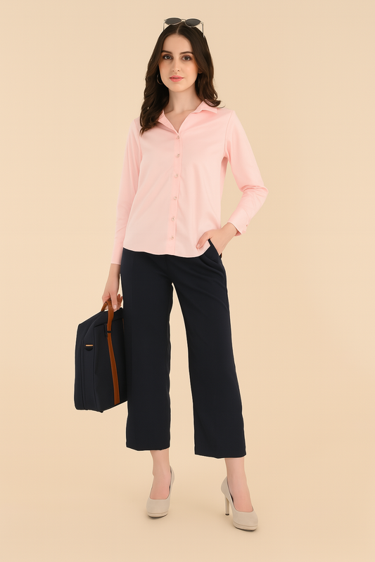 Blush pink satin shirt for women styled with black trousers for office wear