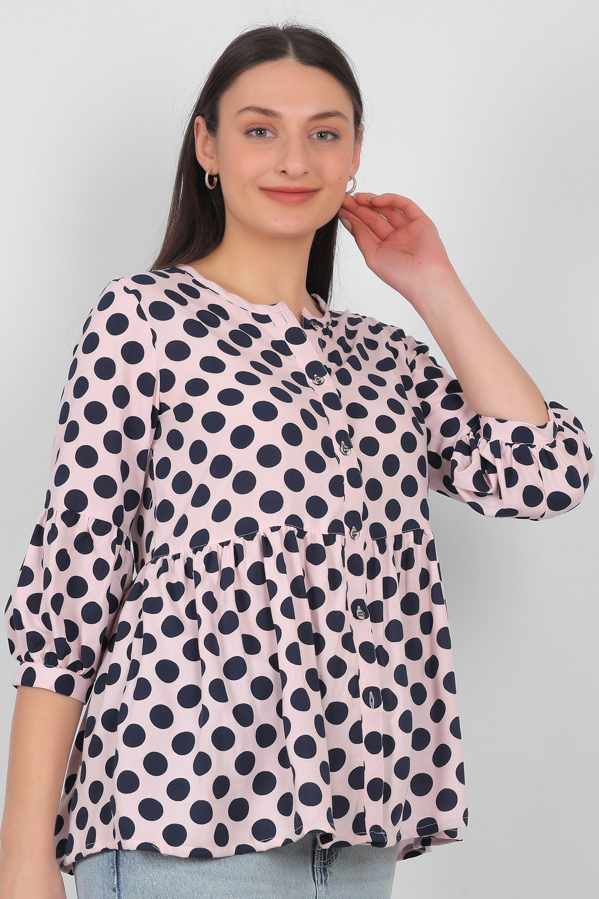 Peach rayon top for women with button detailing and three quarter sleeves