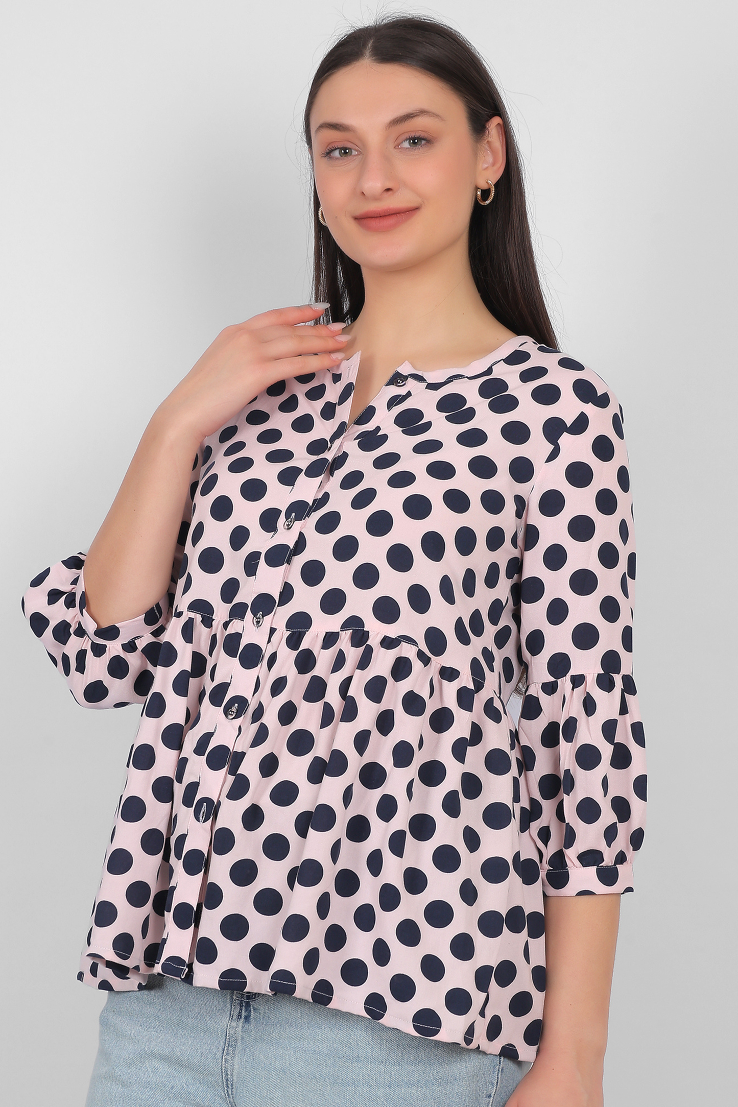 Peach rayon top for women with front button detailing and three quarter sleeves