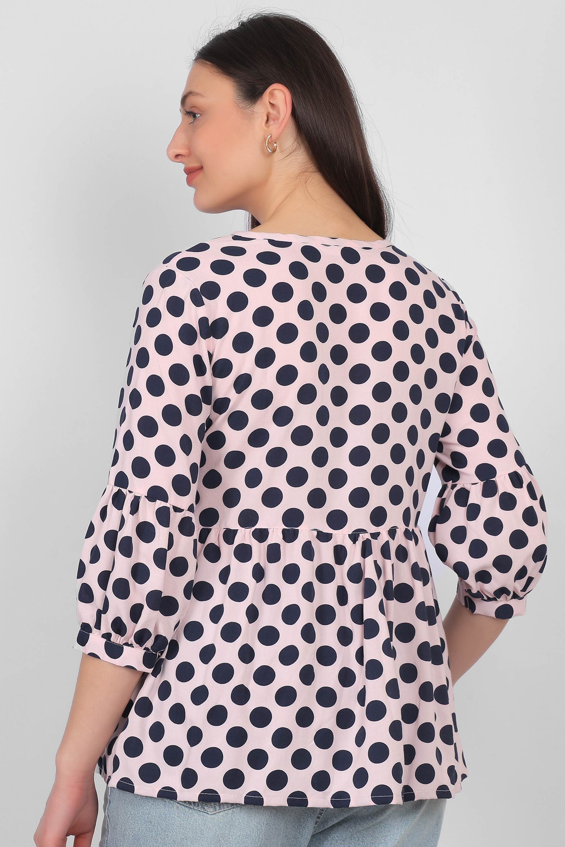 Peach rayon top for women back view with three quarter sleeves