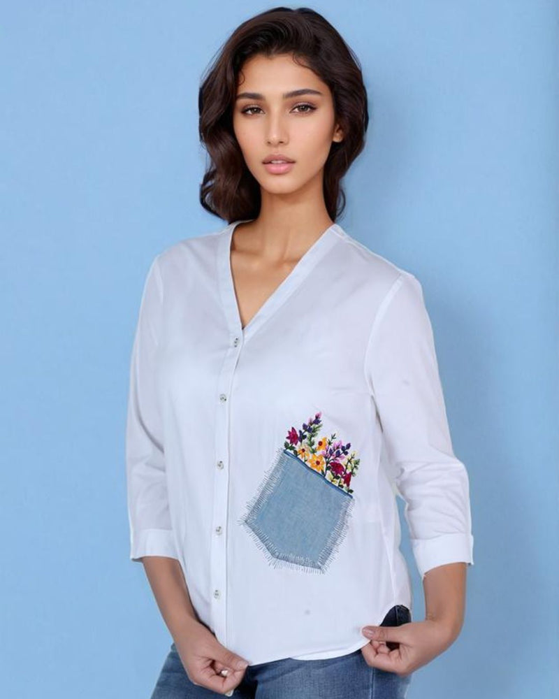 Woman wearing white cotton embroidered pocket shirt – stylish office and casual wear”