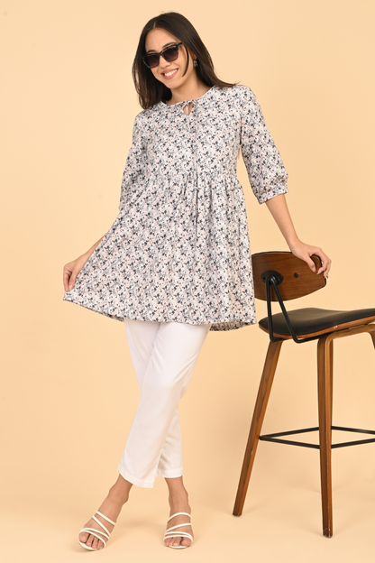 Full length view of women wearing all over printed rayon dress for summer wear in India