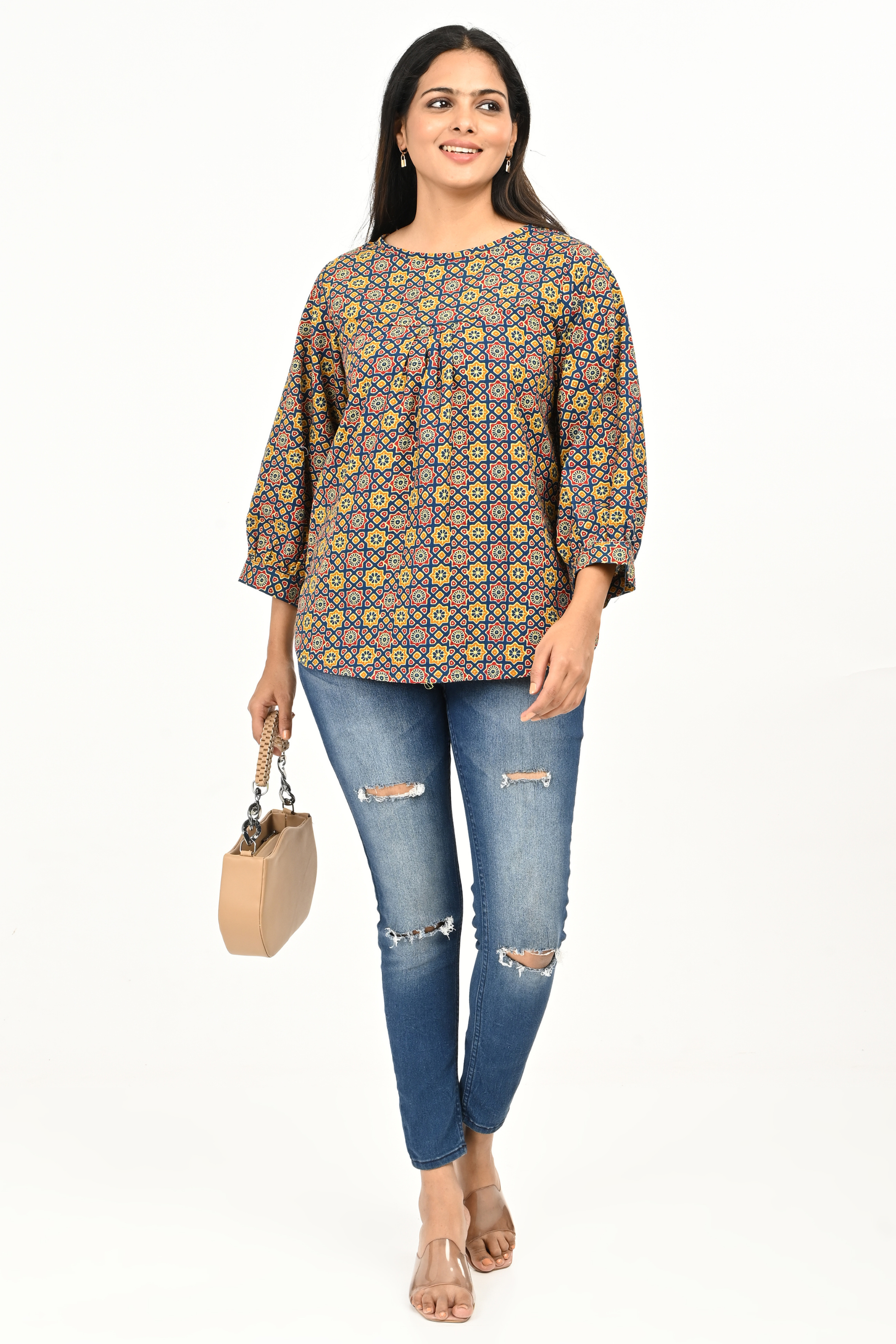 “Women’s 100% cotton multicolour printed top – front view worn with jeans”