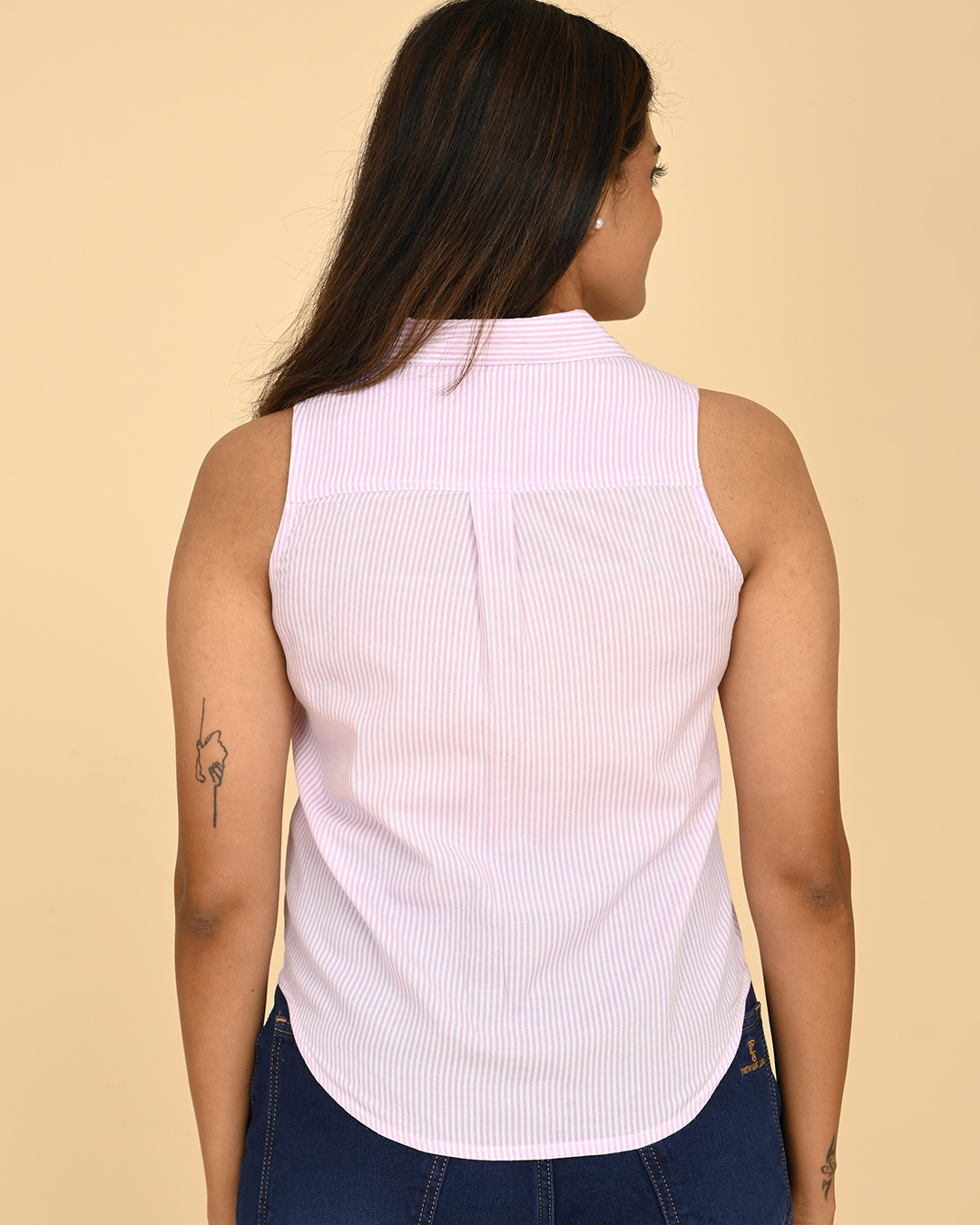 Back view of lilac striped sleeveless cotton shirt for women