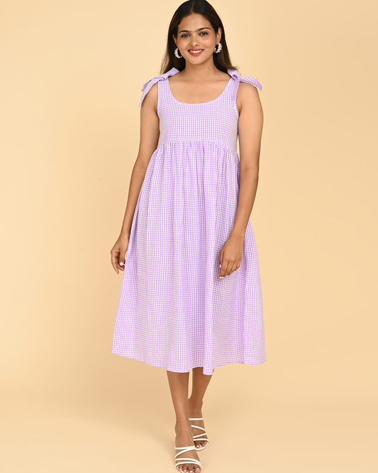 woman wearing cotton check midi dress for women in india