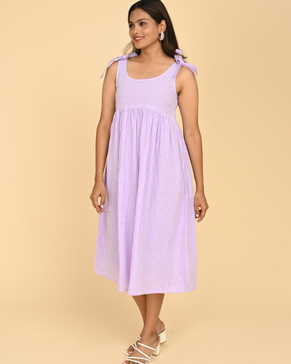 woman wearing cotton check midi dress for women in india