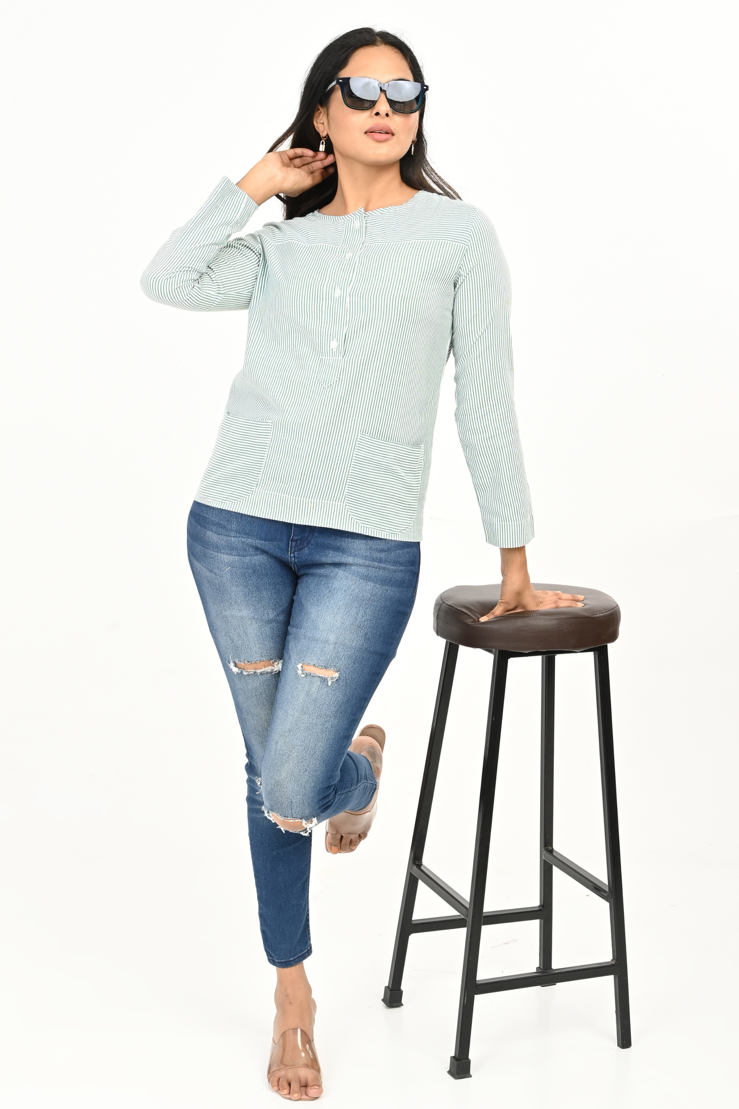 Full body view of mint green & white cotton stripe top for women – summer casual look.