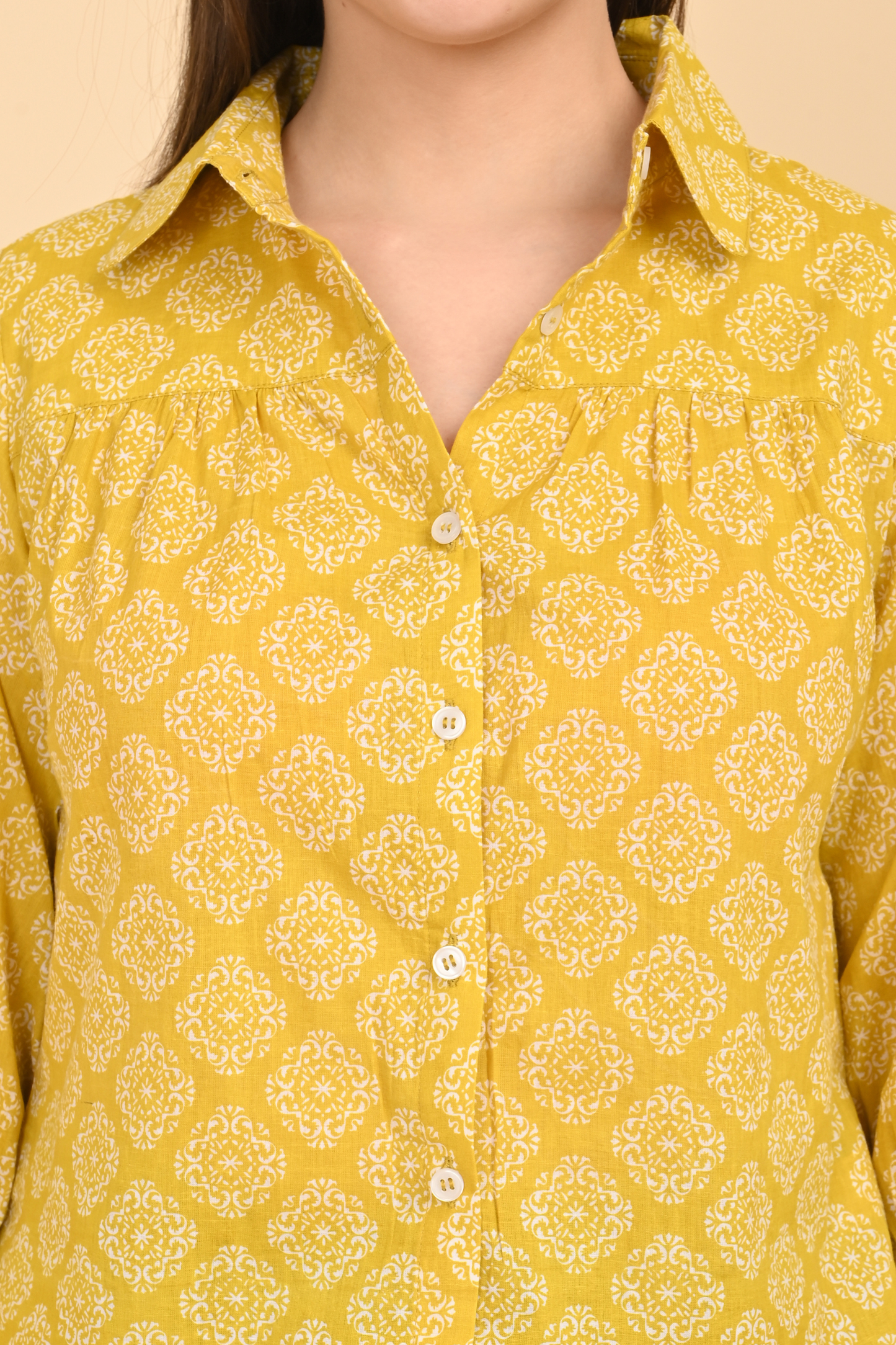 yellow cotton printed top for women neckline detail