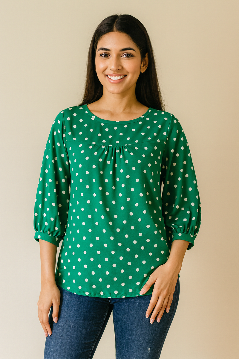 Green polka dot printed rayon top for women front view
