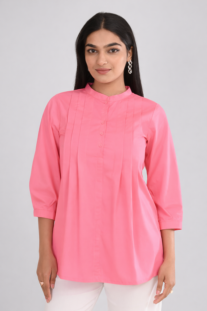 Office wear pink pintuck cotton top for women on grey background