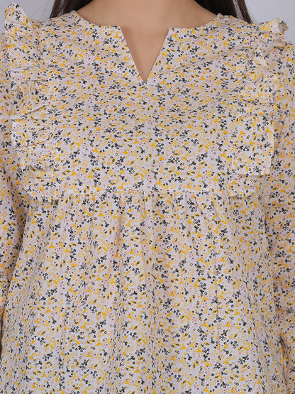 Close-up view of 100% cotton all over printed floral top fabric and neckline design, breathable summer wear for women in India
