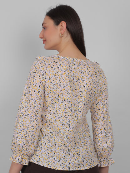 Women wearing 100% cotton all over printed floral top, back view, breathable summer wear for women in India