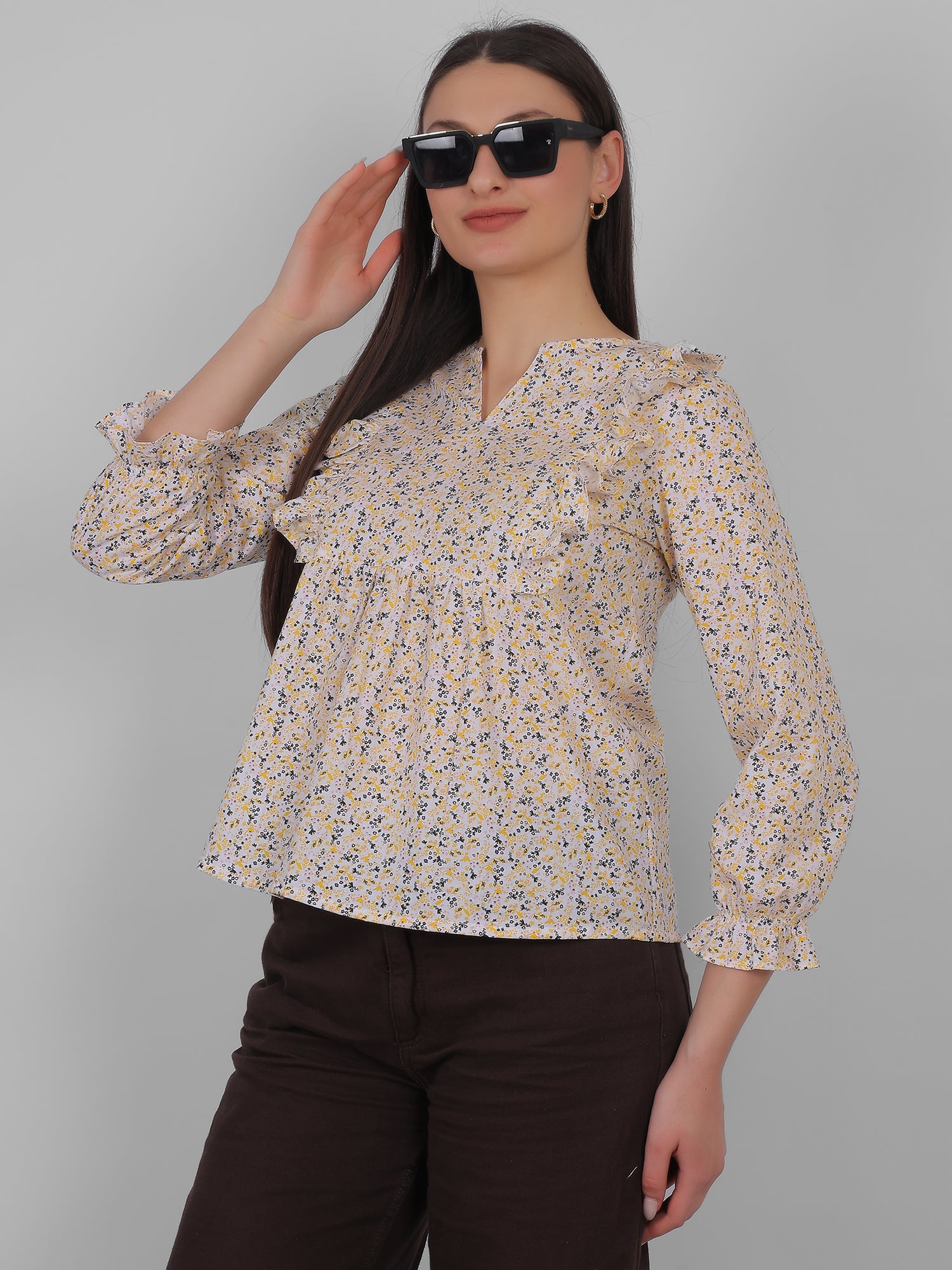 Women wearing 100% cotton all over printed floral top, side pose styling look, breathable summer wear for women in India