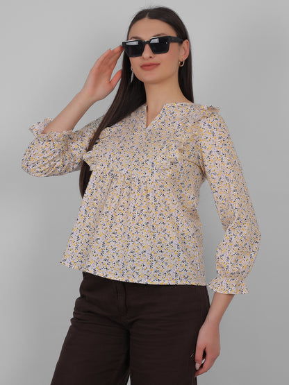 Women wearing 100% cotton all over printed floral top, side pose styling look, breathable summer wear for women in India