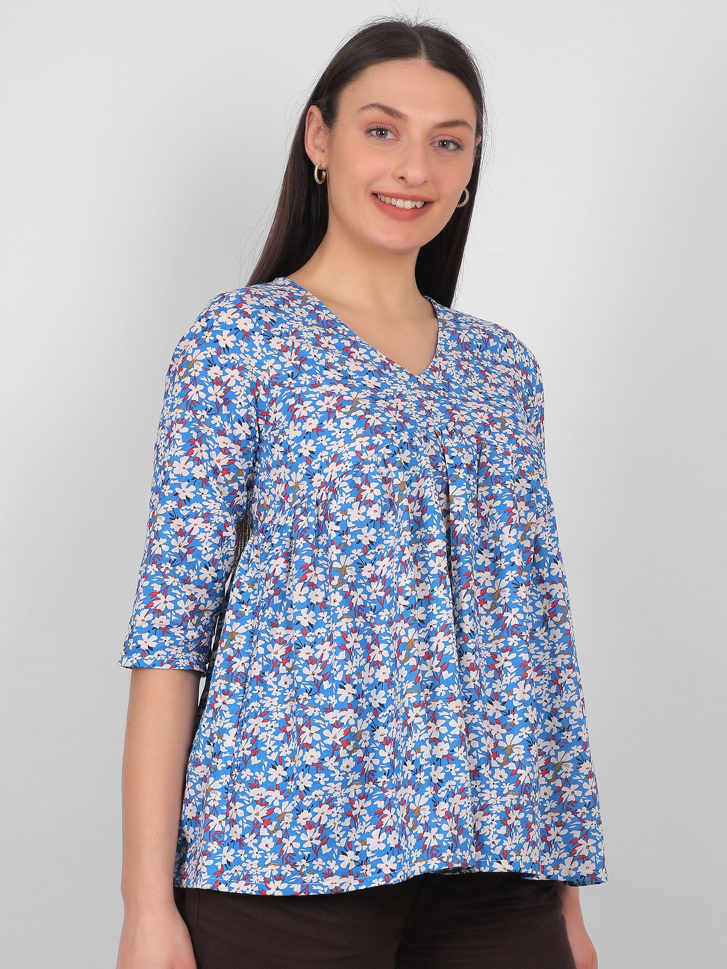 Blue floral printed 100% cotton top for women with V neck and three quarter sleeves, breathable summer wear in India