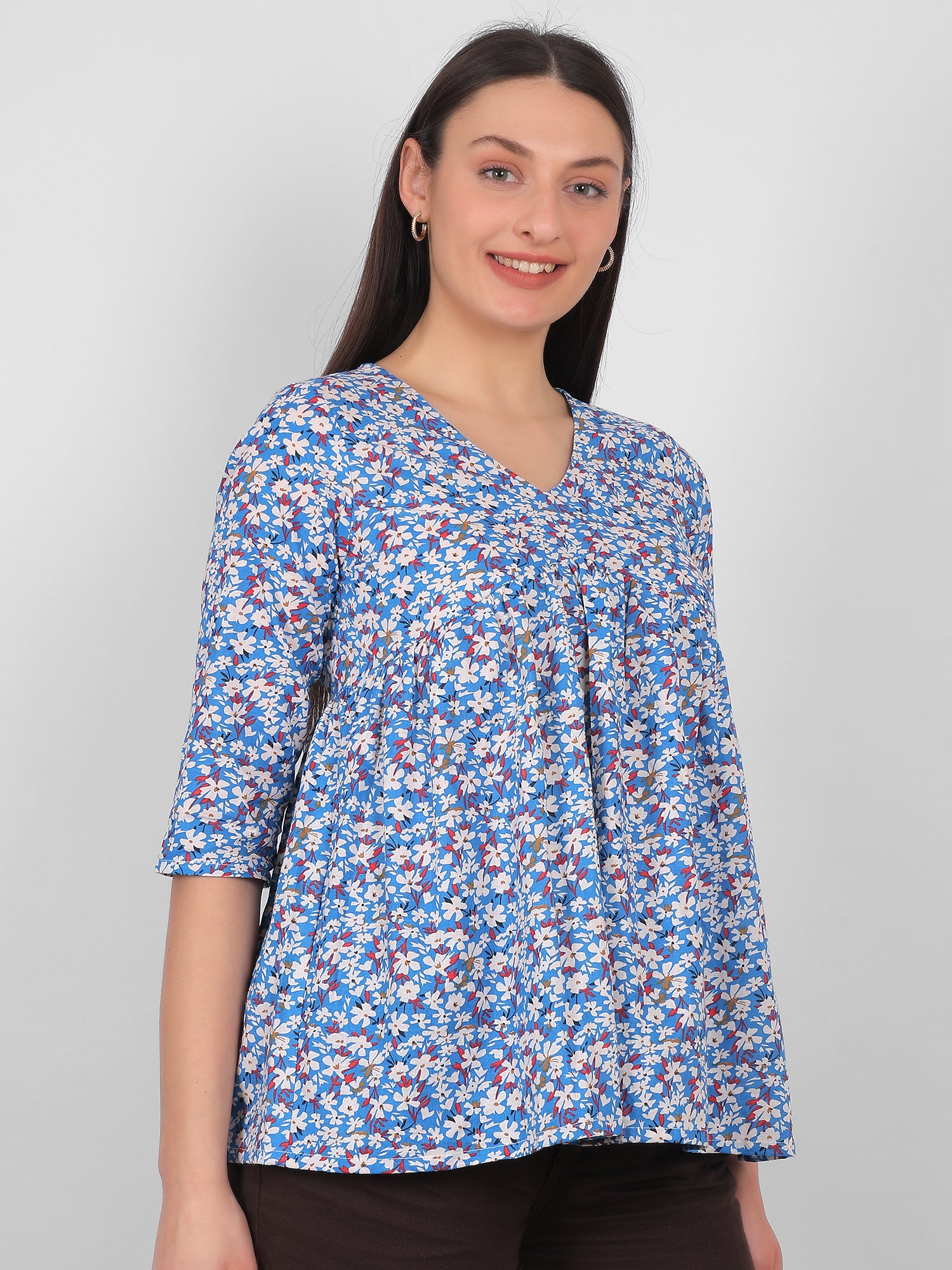 Blue floral printed 100% cotton top for women with V neck and three quarter sleeves, breathable summer wear in India
