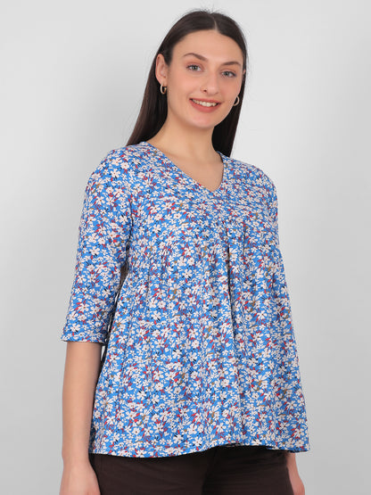 Blue floral printed 100% cotton top for women with V neck and three quarter sleeves, breathable summer wear in India