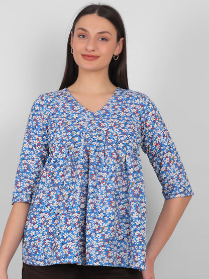 Front facing view of blue floral printed 100% cotton top for women with V neck and three quarter sleeves, summer wear in India