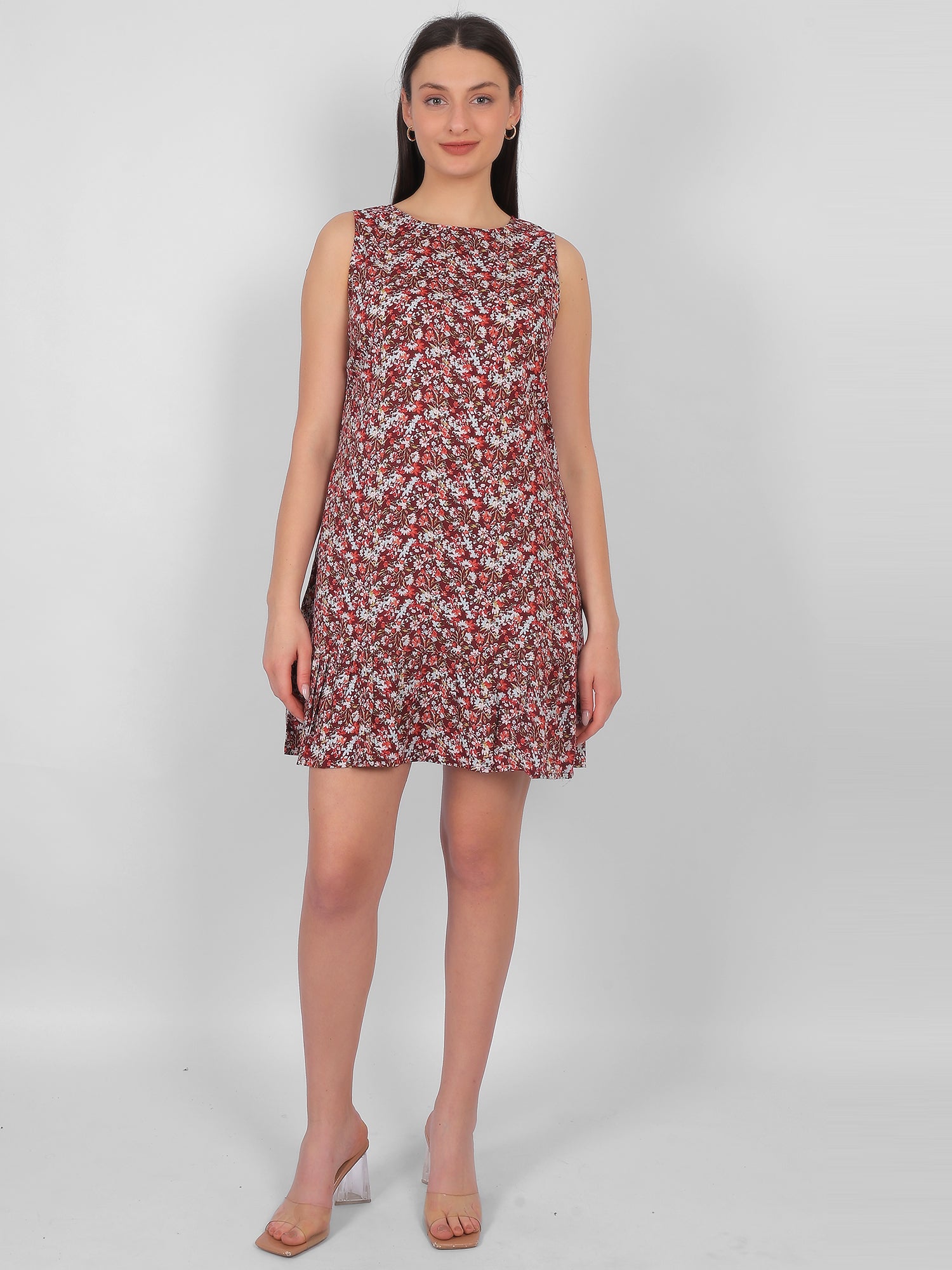 Woman wearing all over printed rayon dress for women in India, sleeveless summer dress in lightweight breathable fabric for casual and daily wear