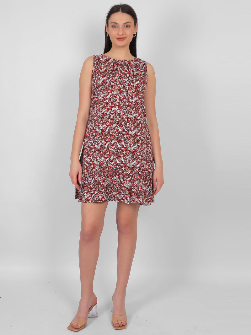 Woman wearing all over printed rayon dress for women in India, sleeveless summer dress in lightweight breathable fabric for casual and daily wear