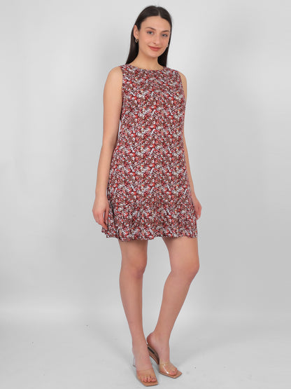 Woman wearing all over printed rayon dress for women in India, front angle sleeveless summer dress in lightweight breathable fabric for daily wear