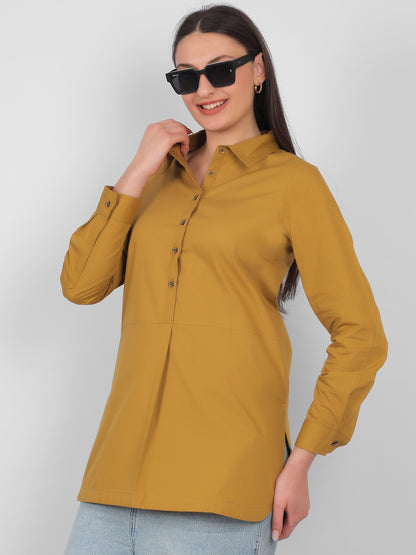 Front angle view of mustard yellow 100% cotton solid long top for women with full sleeves perfect for office wear and casual wear in India