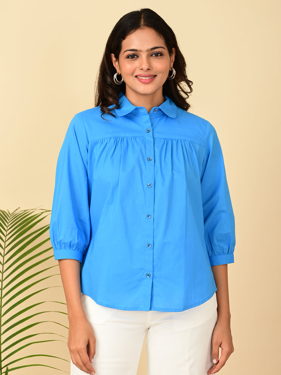 Women's blue cotton shirt with puff 3/4 sleeves and button-down front