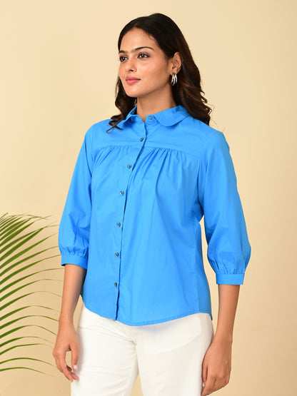 Women's blue cotton shirt with puff 3/4 sleeves, Peter Pan collar and button front