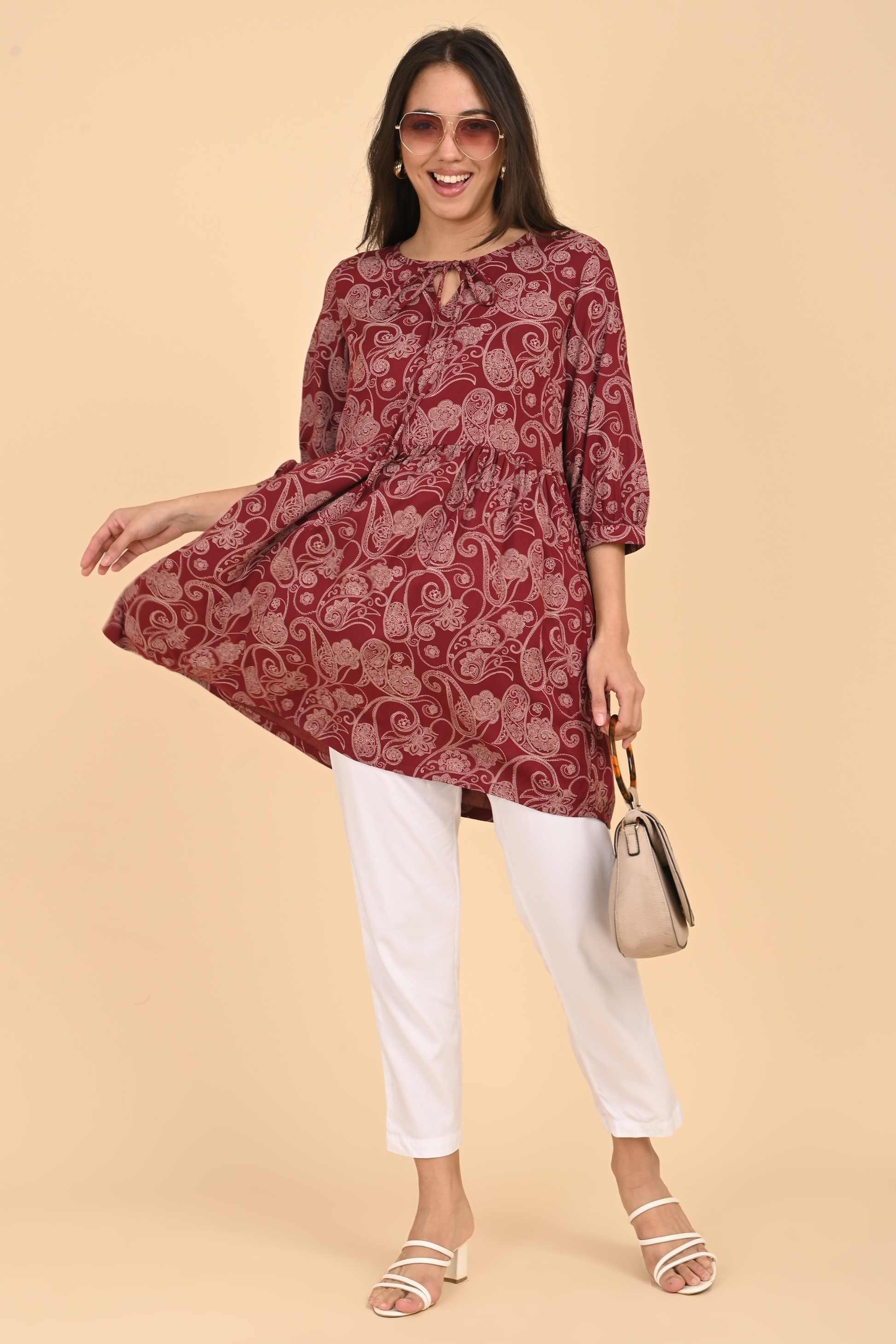Alternative front view of the maroon paisley rayon tunic, highlighting the V-neck and relaxed fit for daily wear.