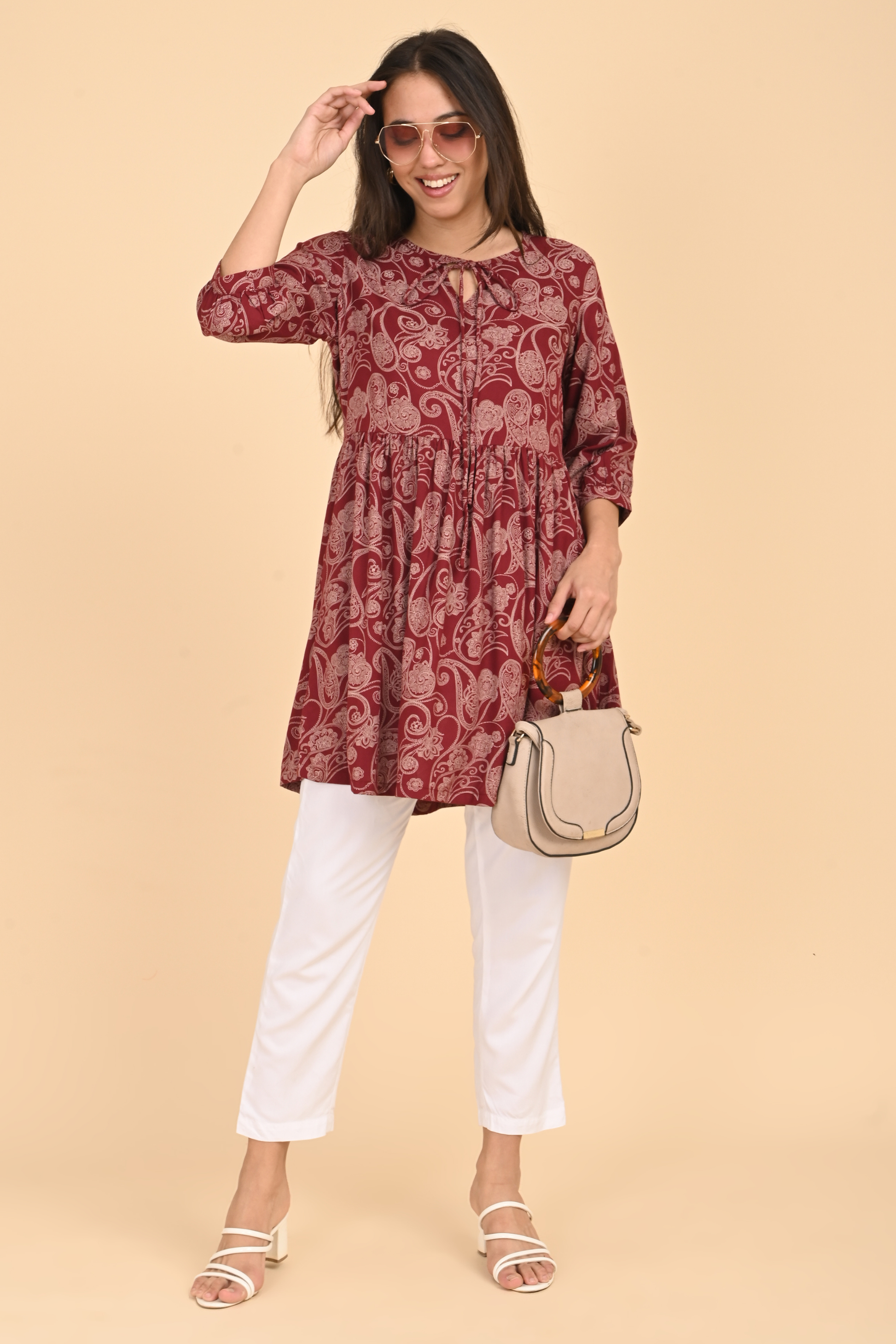 Alternative front angle of the maroon paisley print rayon tunic, showing the loose fit and sleeve detail.