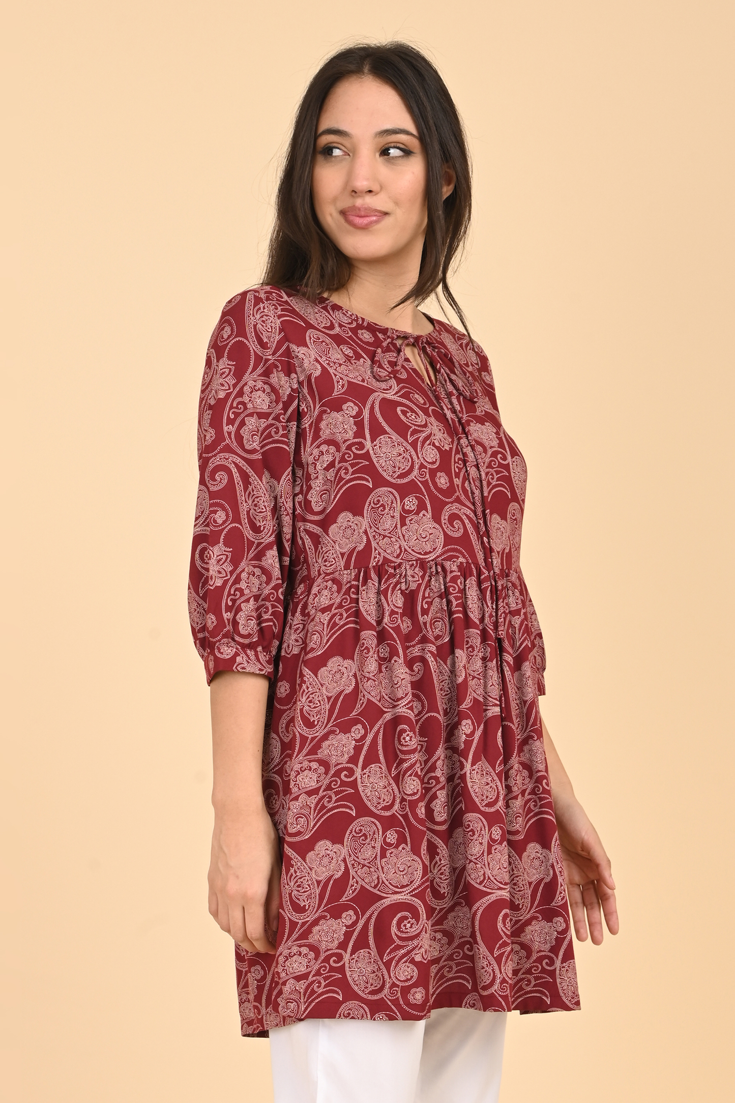 Maroon paisley print rayon tunic for women, loose fit, front view.