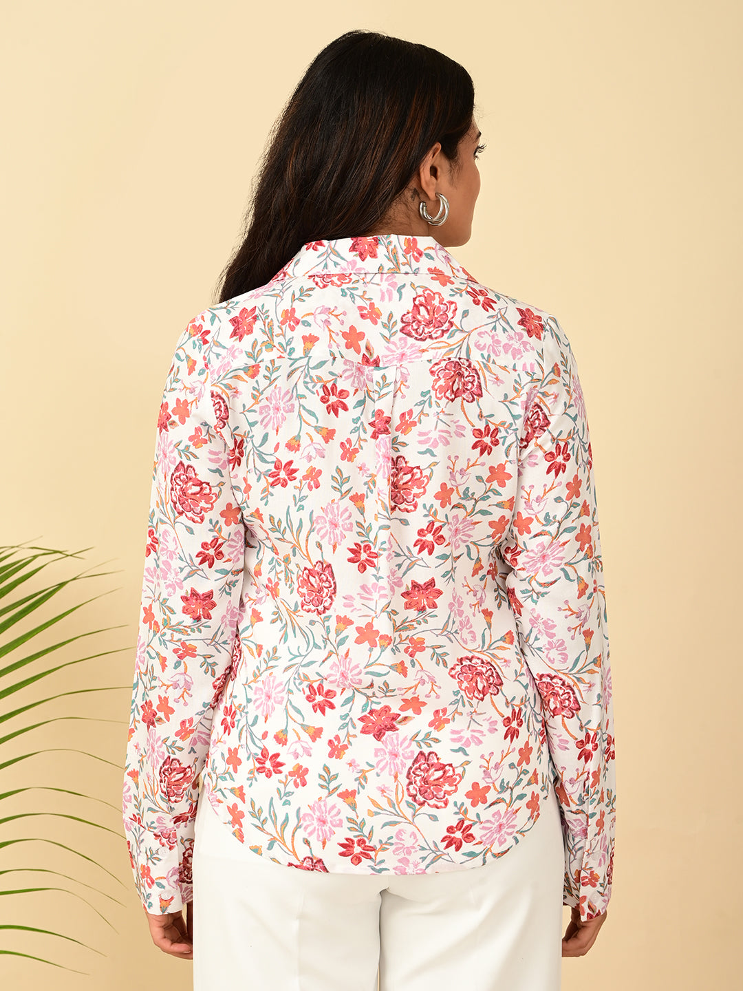 Back view of a pink floral full sleeve women's shirt showing the rear fit and floral print for women in India by Classy Clothing