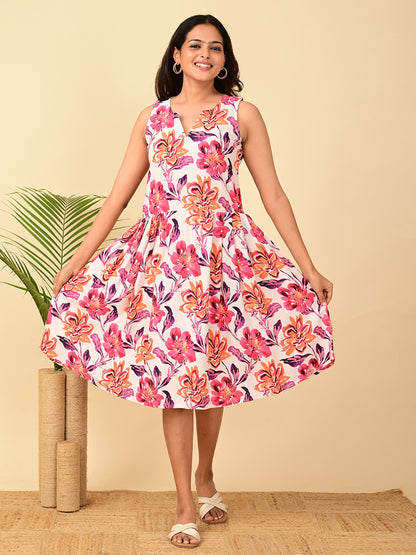 Pink floral AOP rayon sleeveless midi dress for women in India, breathable lightweight fabric, comfortable casual summer dress for office, travel, brunch and everyday wear.